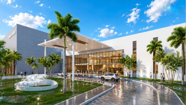 Event Center entrance with fountain and palm trees